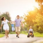 Family walking together down the street after receiving Life Insurance from RG Insurance Agency in Pharr, TX