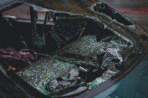 A vehicle with a shattered windshield 