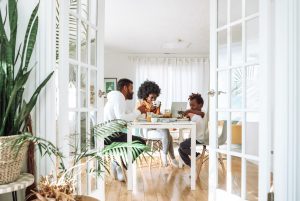 A family sitting a dining table together