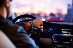 A man driving a car