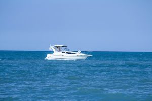 A white boat on the water